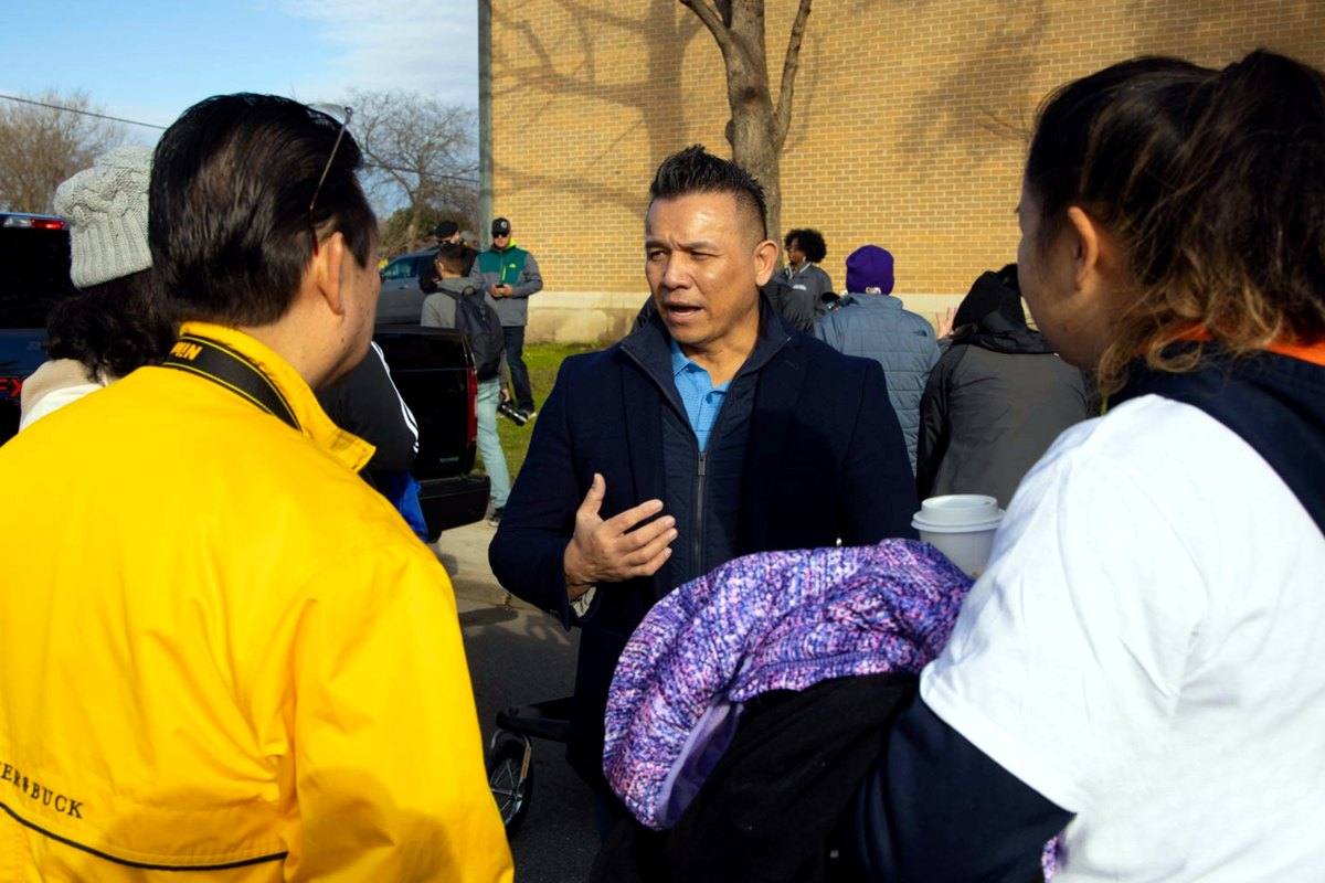 Willie listening to residents in the community