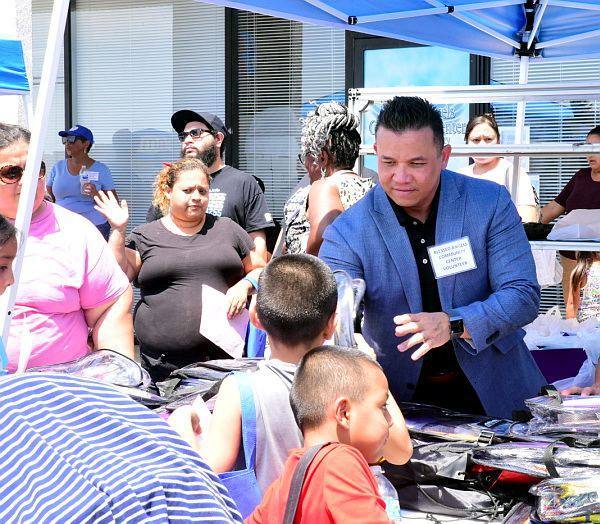 Willie serving families at a community event