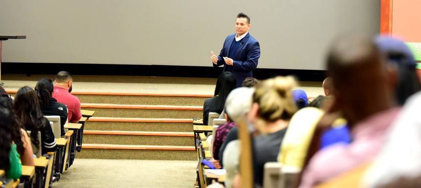 Willie addressing a university audience