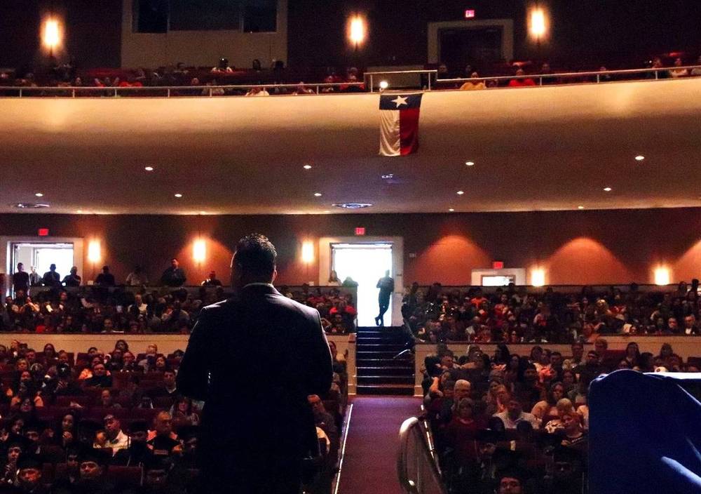 Willie commanding a large auditorium